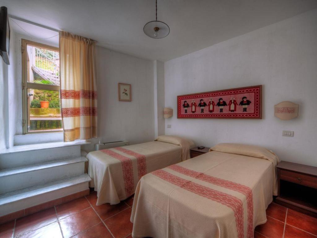 Affitta Camere Casa Delle Rose Villanova Monteleone Bagian luar foto
